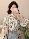 Buy SHEIN DAZY Floral Print Button Front Lantern Sleeve Blouse in Pakistan