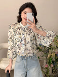 Buy SHEIN DAZY Floral Print Button Front Lantern Sleeve Blouse in Pakistan