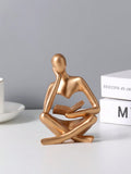 Buy SHEIN Resin Abstract Figure Reading Decorative Desk Ornament in Pakistan