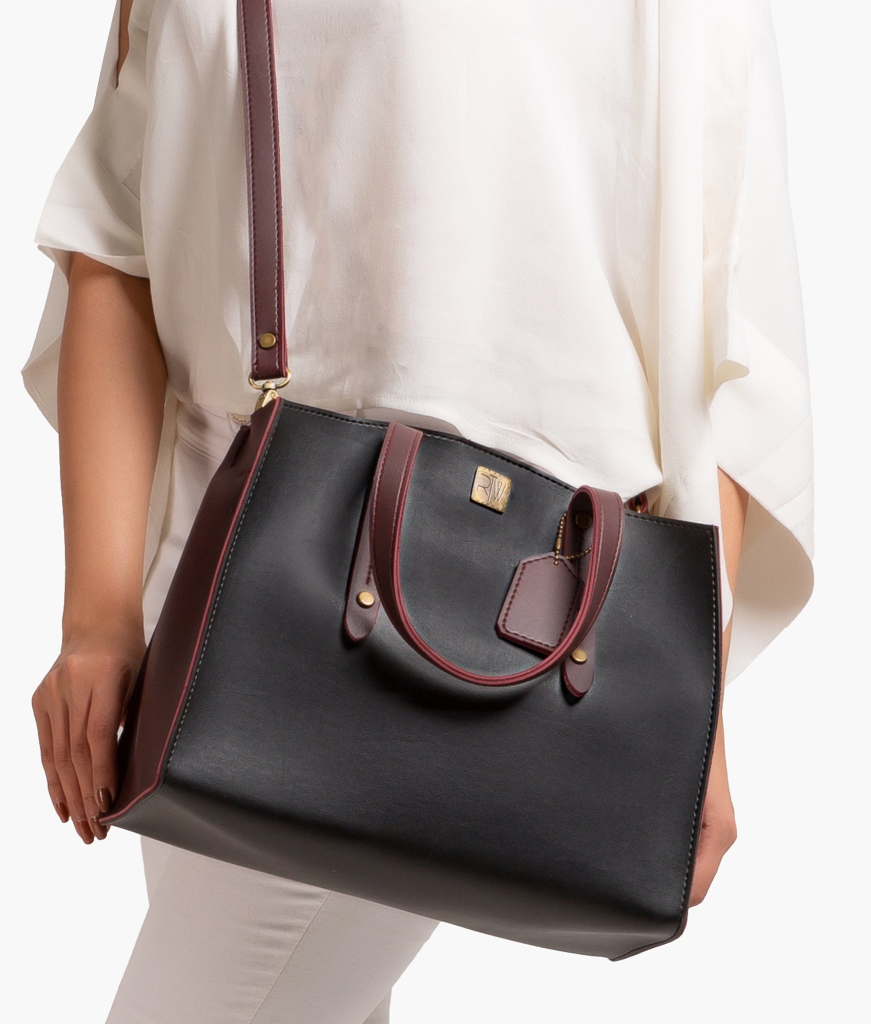 Buy Black with burgundy multi compartment satchel bag in Pakistan