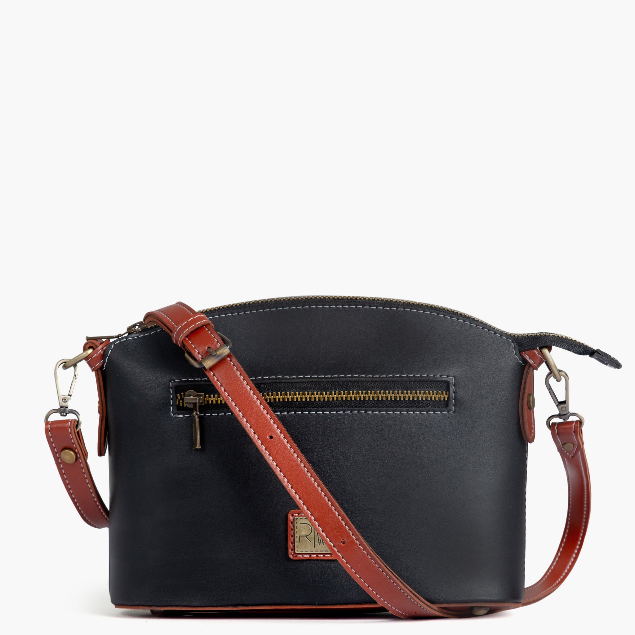 Buy Black and rust dome cross-body bag in Pakistan