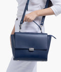 Buy Blue mini messenger bag in Pakistan