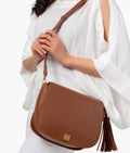 Buy Brown foldover saddle bag in Pakistan