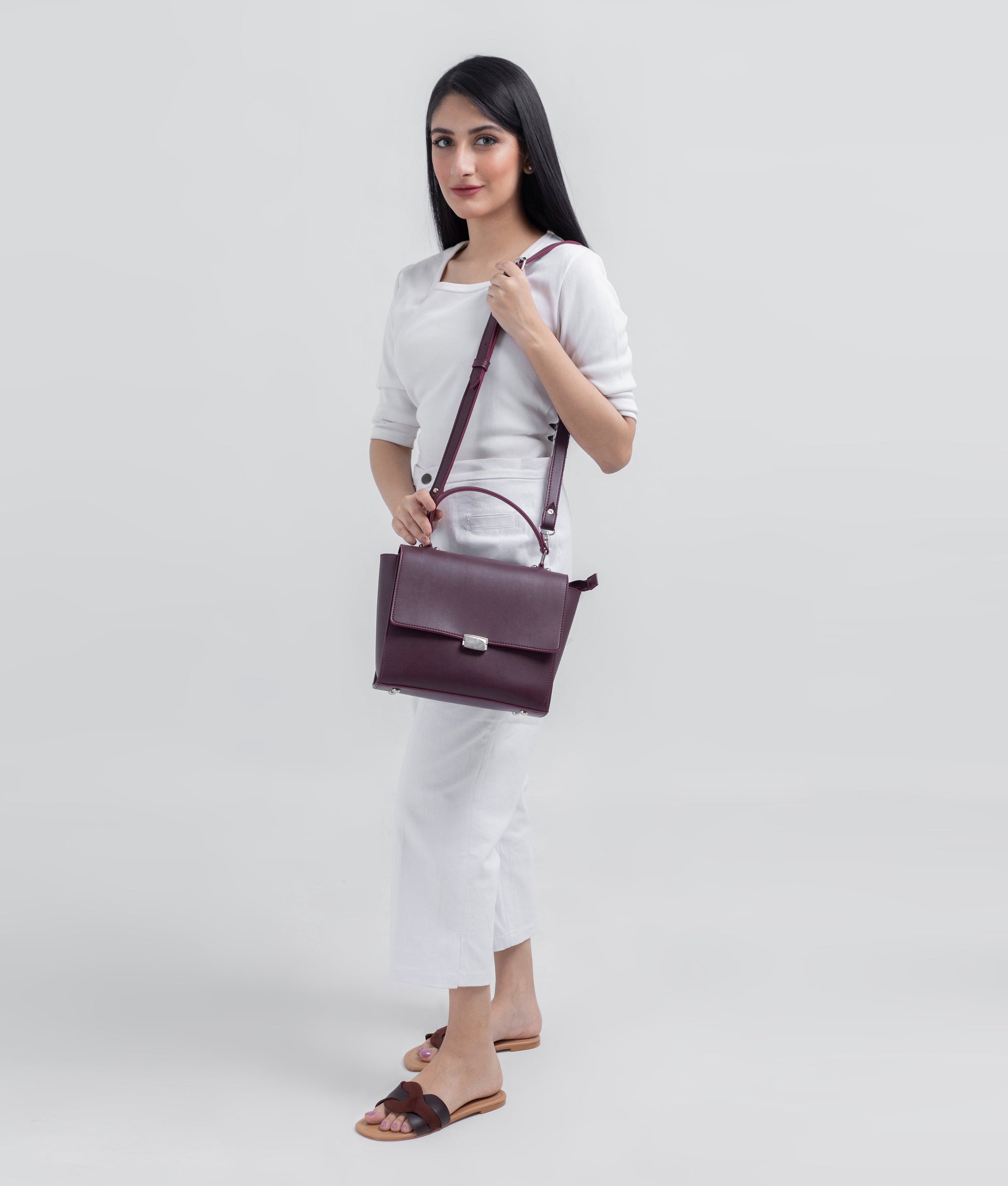 Buy Burgundy mini messenger bag in Pakistan