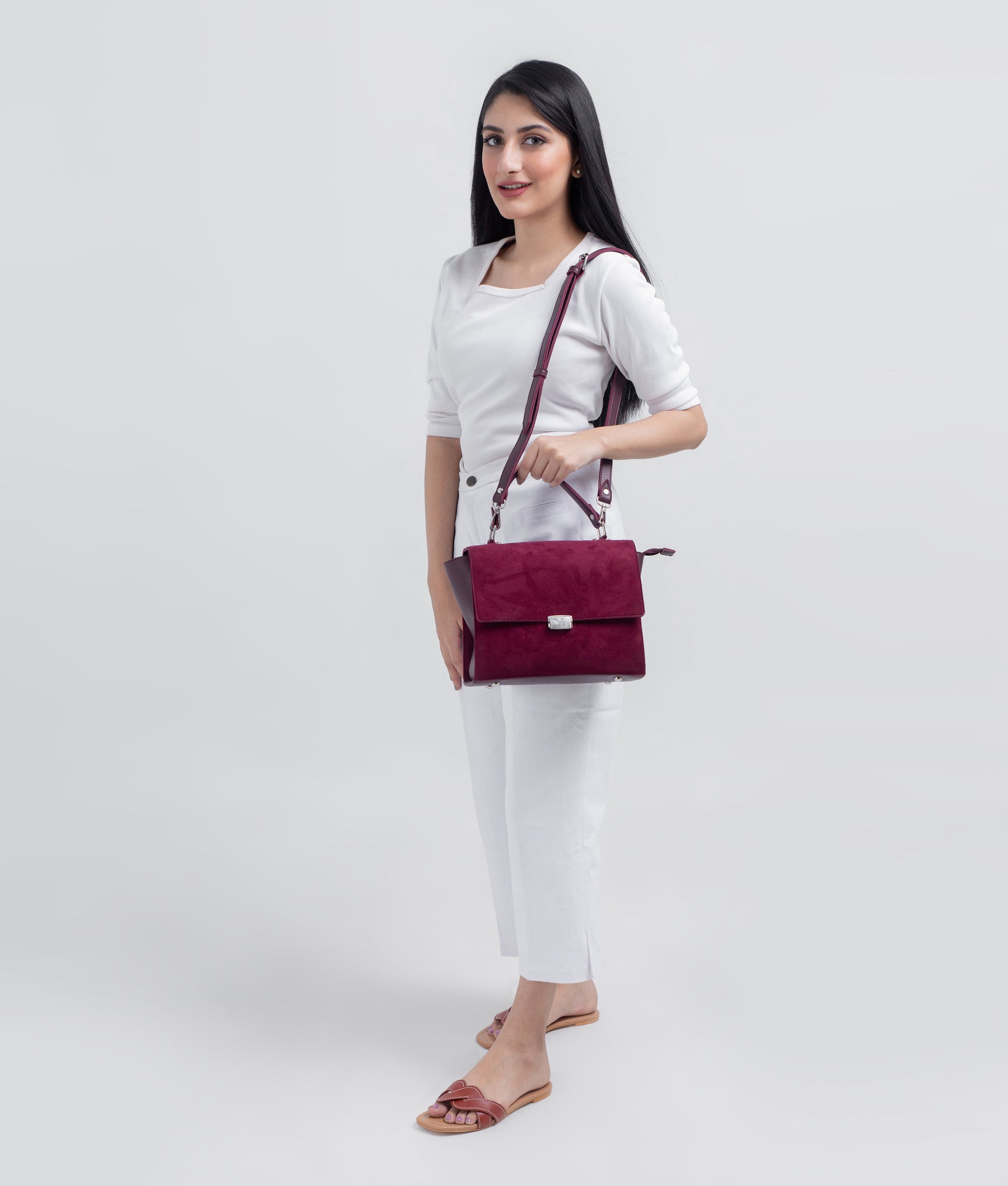 Buy Burgundy suede mini messenger bag in Pakistan