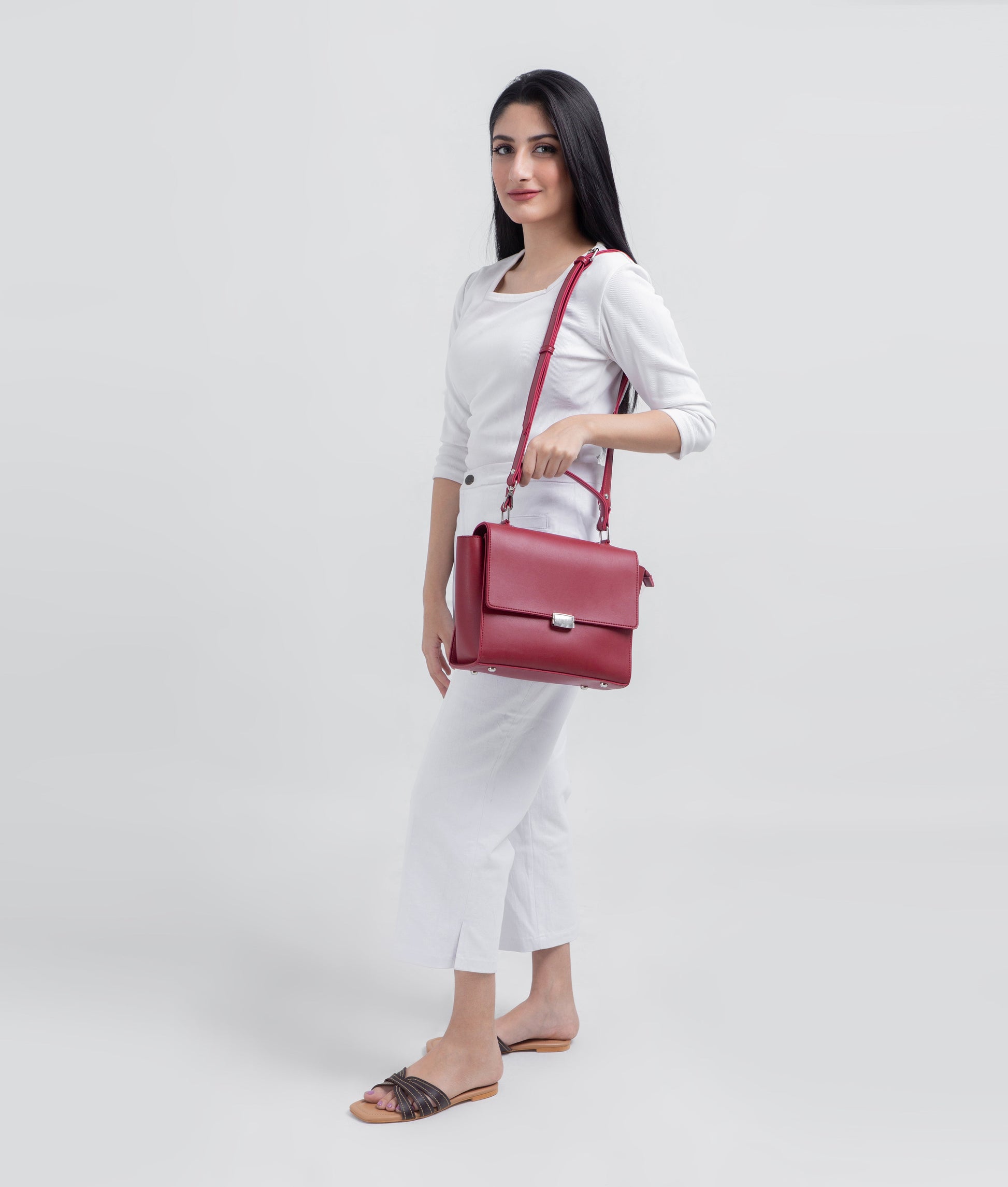 Buy Maroon mini messenger bag in Pakistan