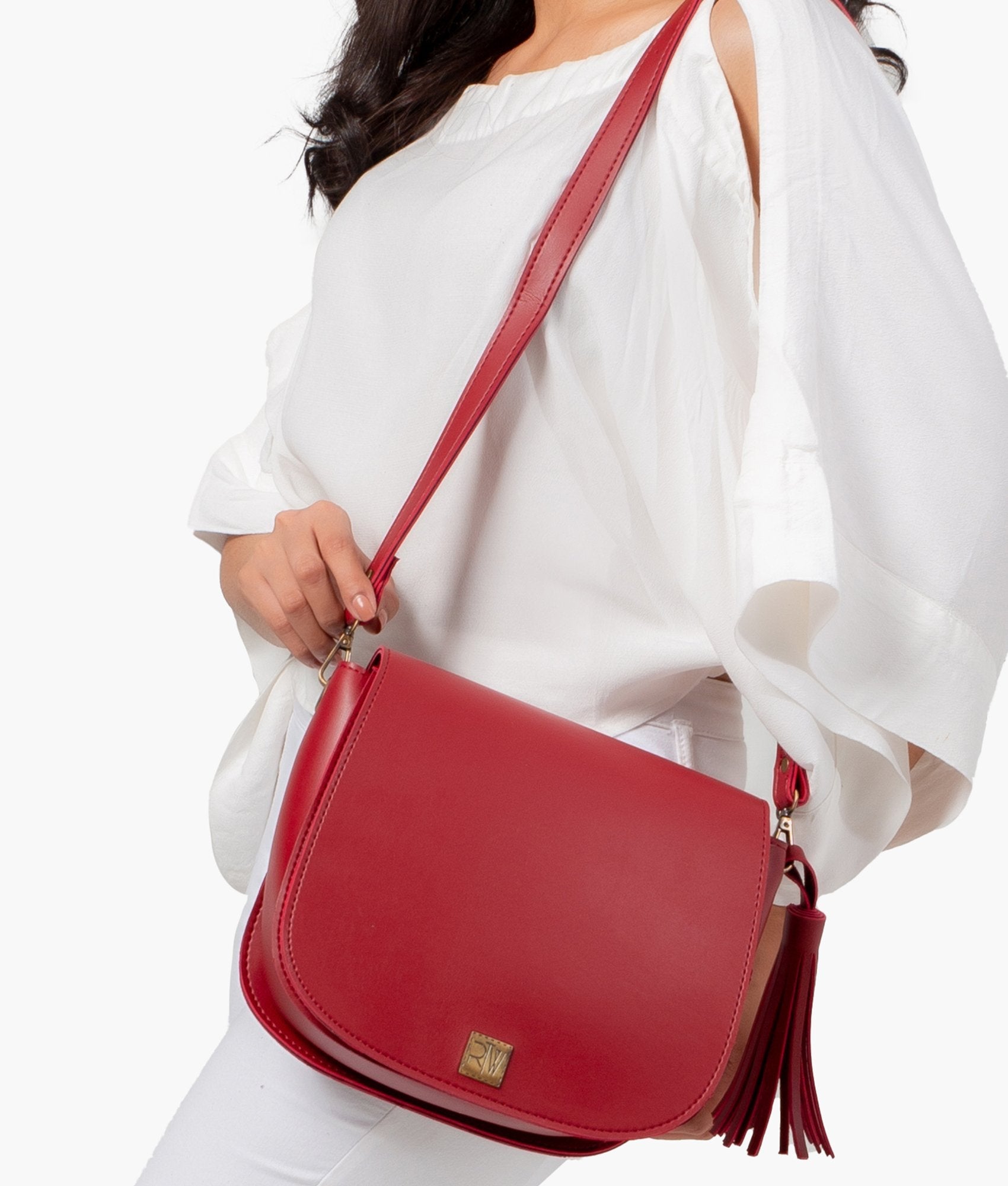 Buy Maroon foldover saddle bag in Pakistan