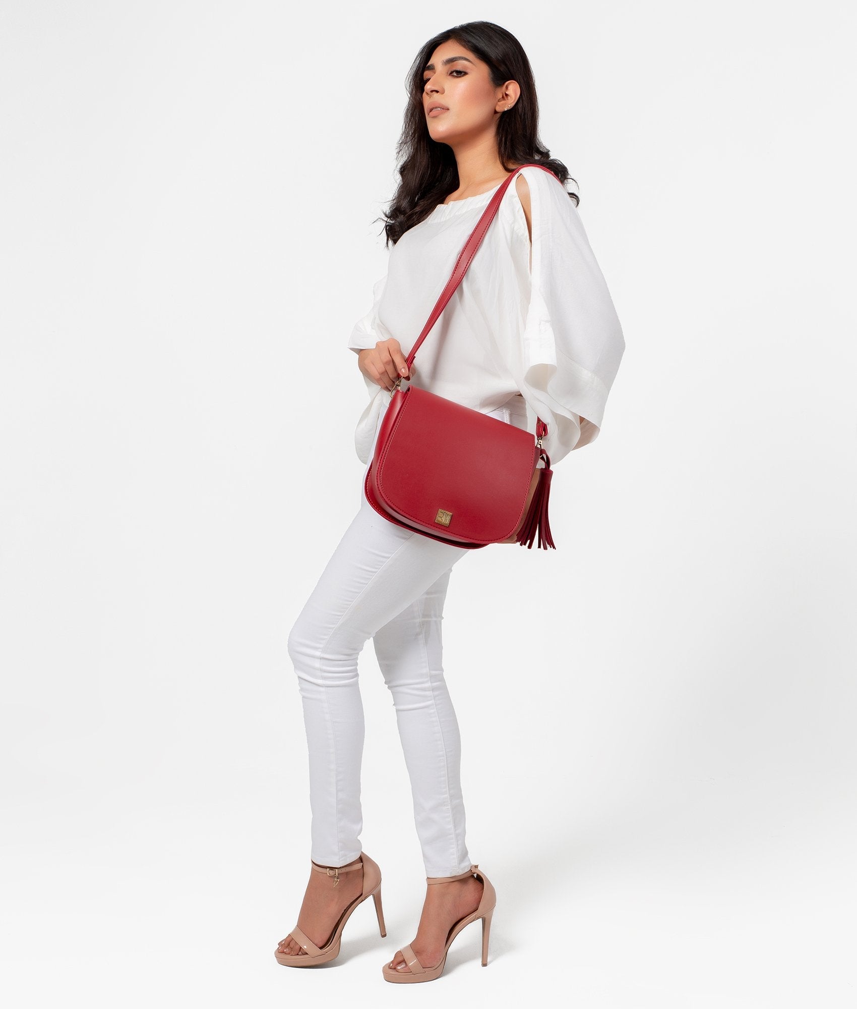 Buy Maroon foldover saddle bag in Pakistan