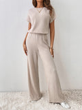 Buy SHEIN Essnce Solid Ribbed Knit Cut Out Back Jumpsuit in Pakistan