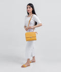 Buy Yellow mini messenger bag in Pakistan