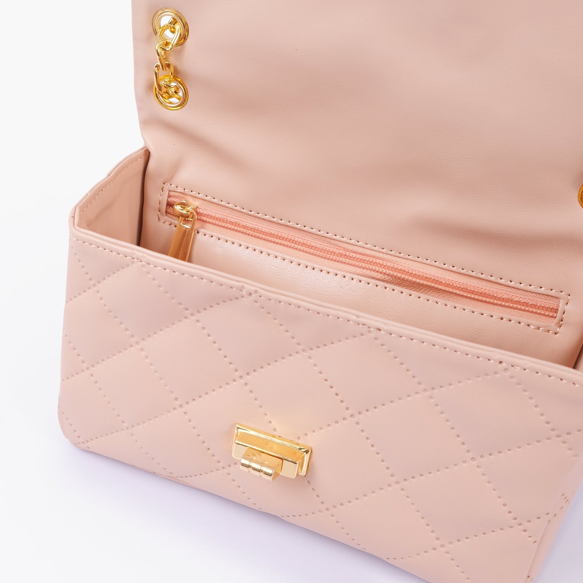 Buy Baby pink quilted mini bag with chain in Pakistan