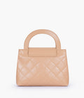 Buy Beige flap quilted bag with top handle in Pakistan