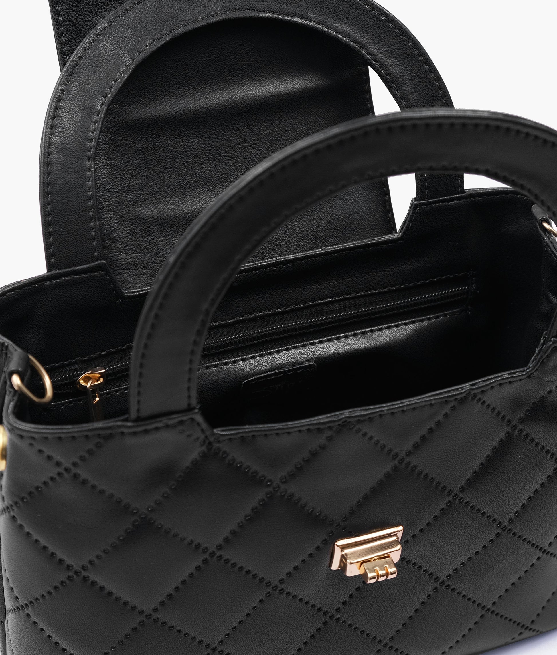 Buy Black flap quilted bag with top handle in Pakistan