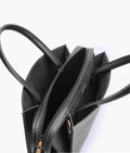 Buy Black trapeze top-handle bag in Pakistan