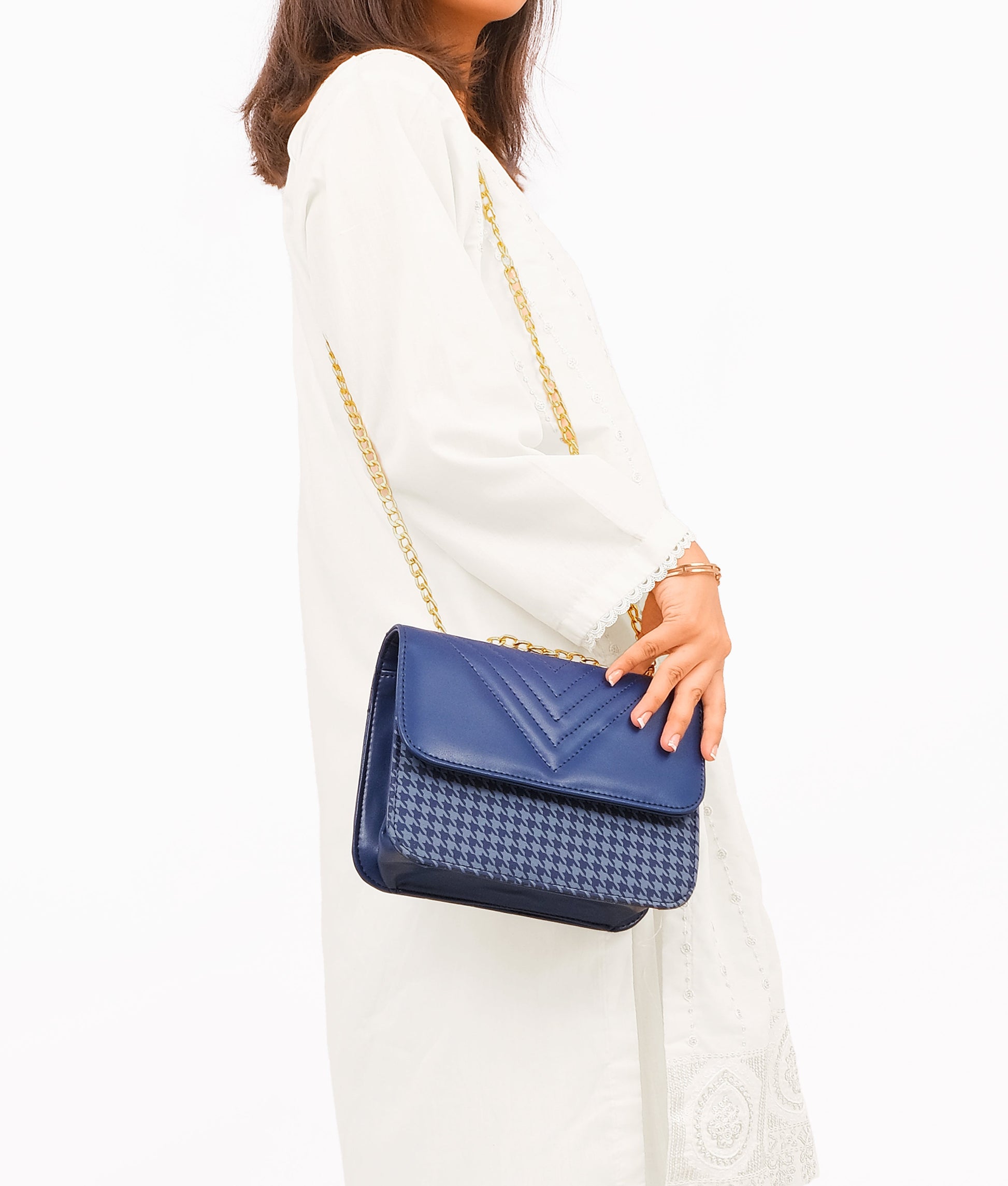 Buy Blue houndstooth chain cross-body bag in Pakistan