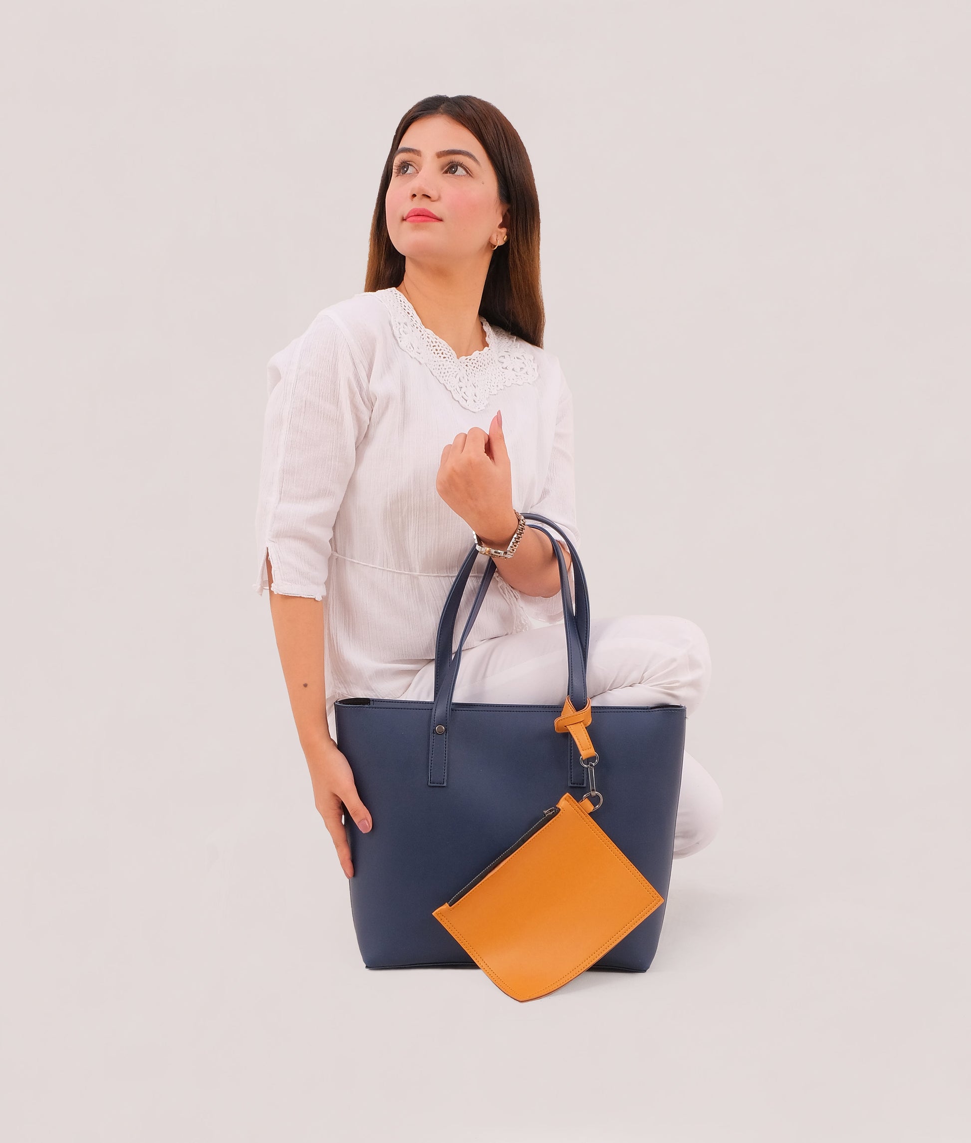 Buy Blue tote bag with detachable pouch in Pakistan