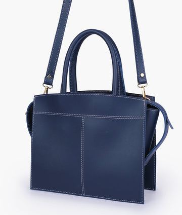 Buy Blue trapeze top-handle bag in Pakistan