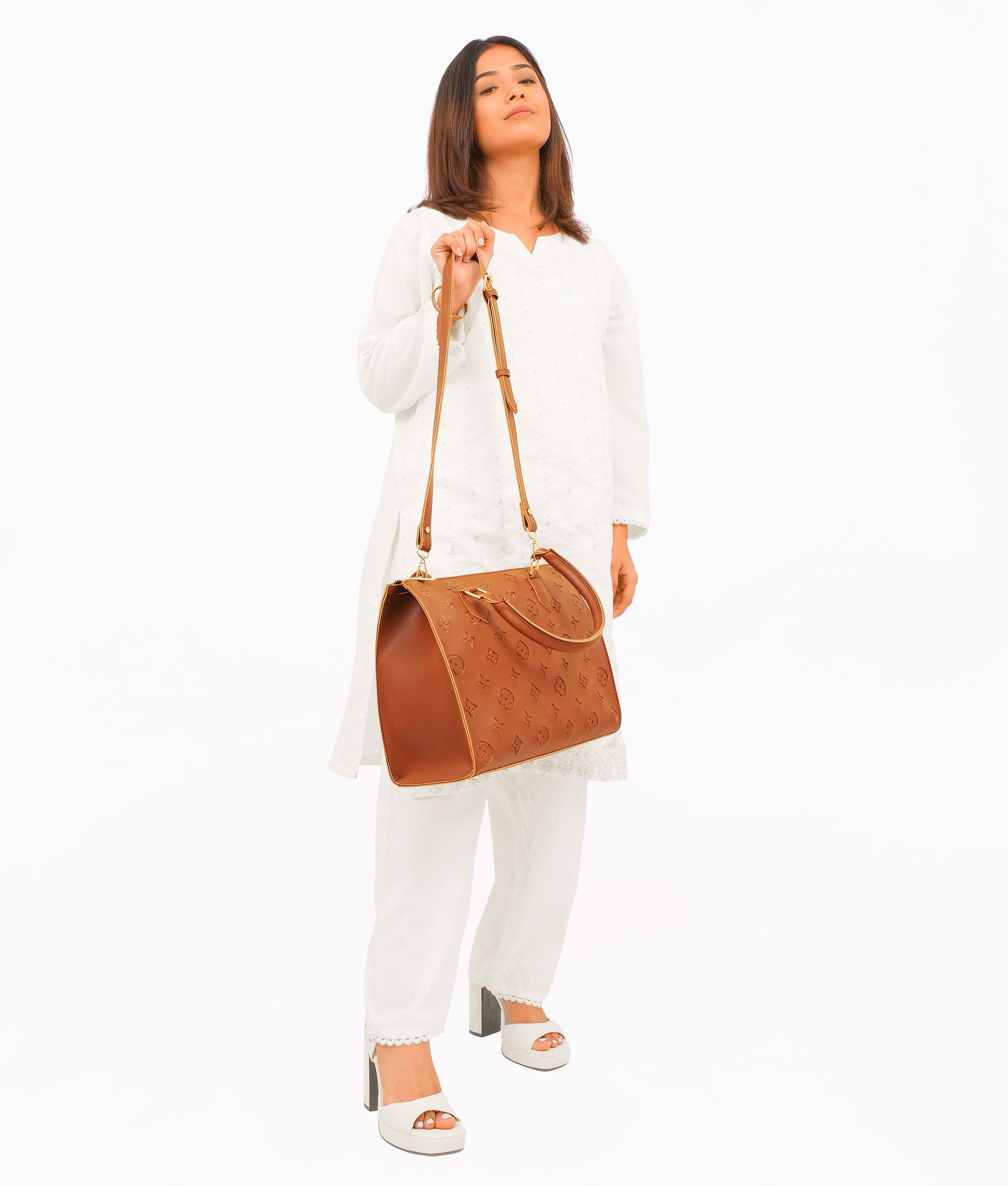 Buy Brown on-the-go handbag in Pakistan