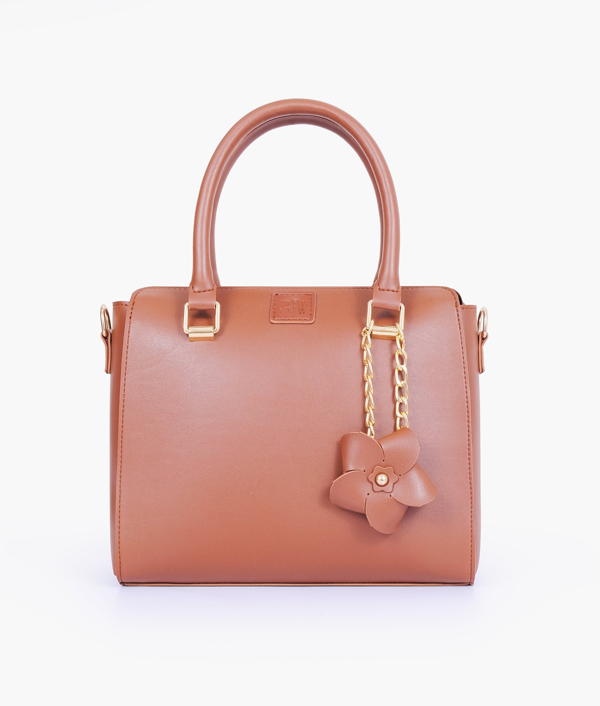 Buy Brown handbag with flower charm in Pakistan