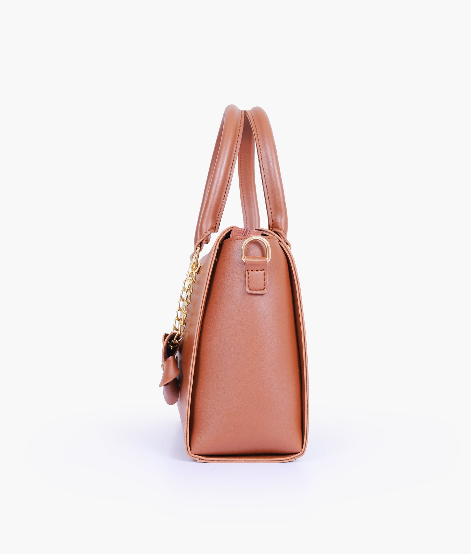 Buy Brown handbag with flower charm in Pakistan