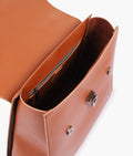 Buy Brown flap-over top-handle bag in Pakistan