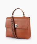 Buy Brown flap-over top-handle bag in Pakistan