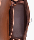 Buy Brown suede push-lock messenger bag in Pakistan