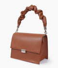 Buy Brown top-handle mini cross-body bag in Pakistan