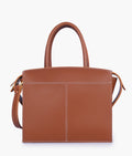 Buy Brown trapeze top-handle bag in Pakistan