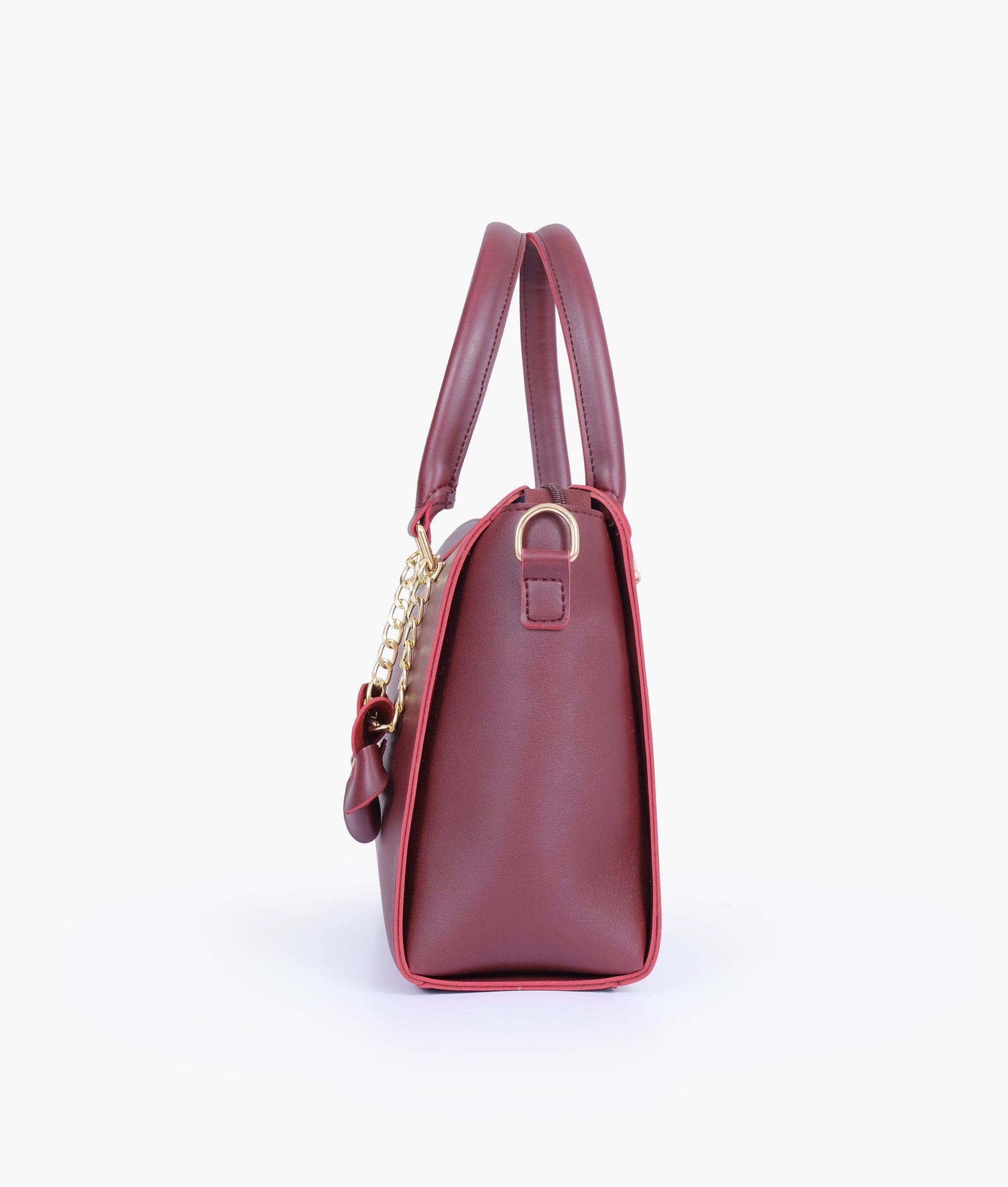 Buy Burgundy handbag with flower charm in Pakistan