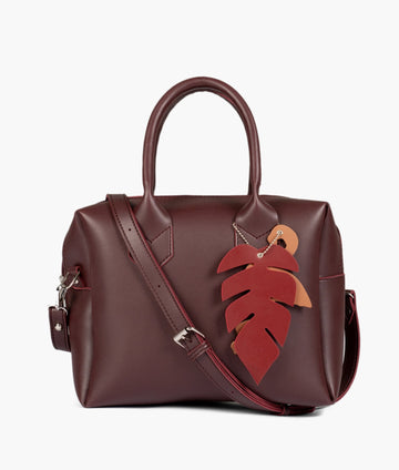 Buy Burgundy mini bowling bag in Pakistan