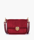 Buy Burgundy suede saddle bag with twist lock in Pakistan