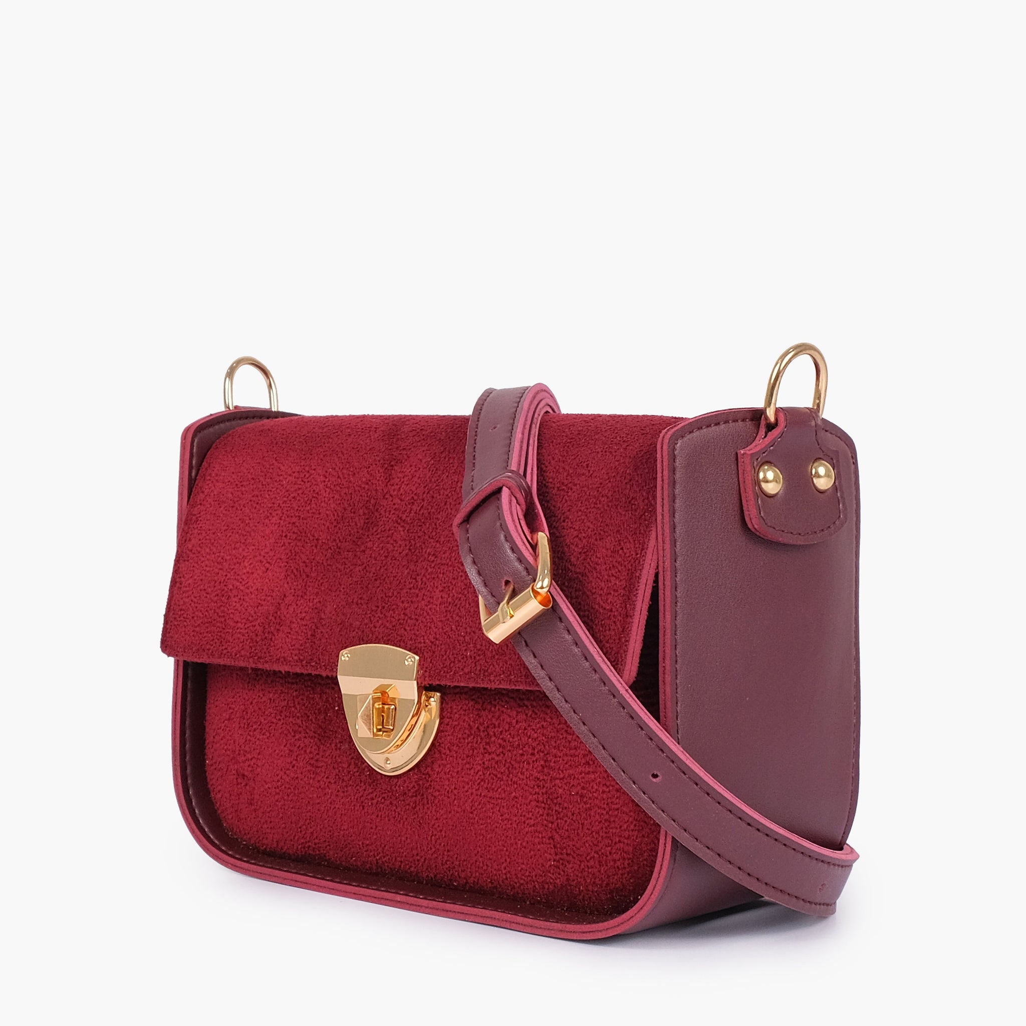 Buy Burgundy suede saddle bag with twist lock in Pakistan