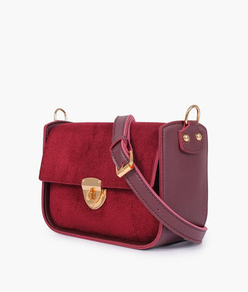 Buy Burgundy suede saddle bag with twist lock in Pakistan