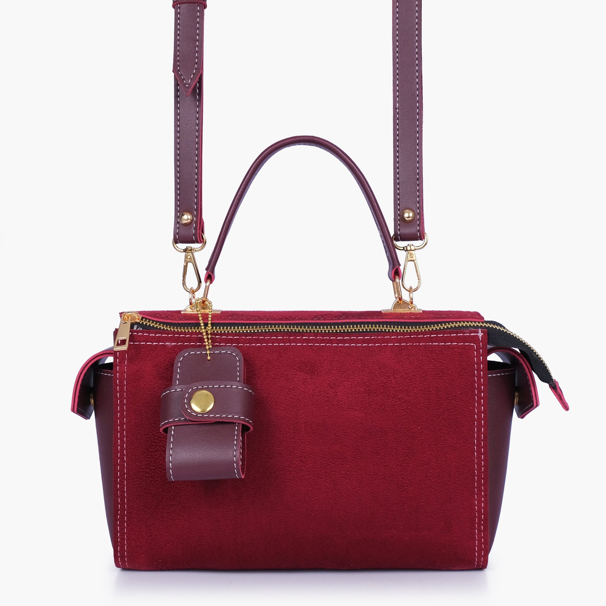 Buy Burgundy suede bowling bag with top-handle in Pakistan