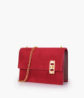 Buy Burgundy suede chain shoulder bag with twist lock in Pakistan