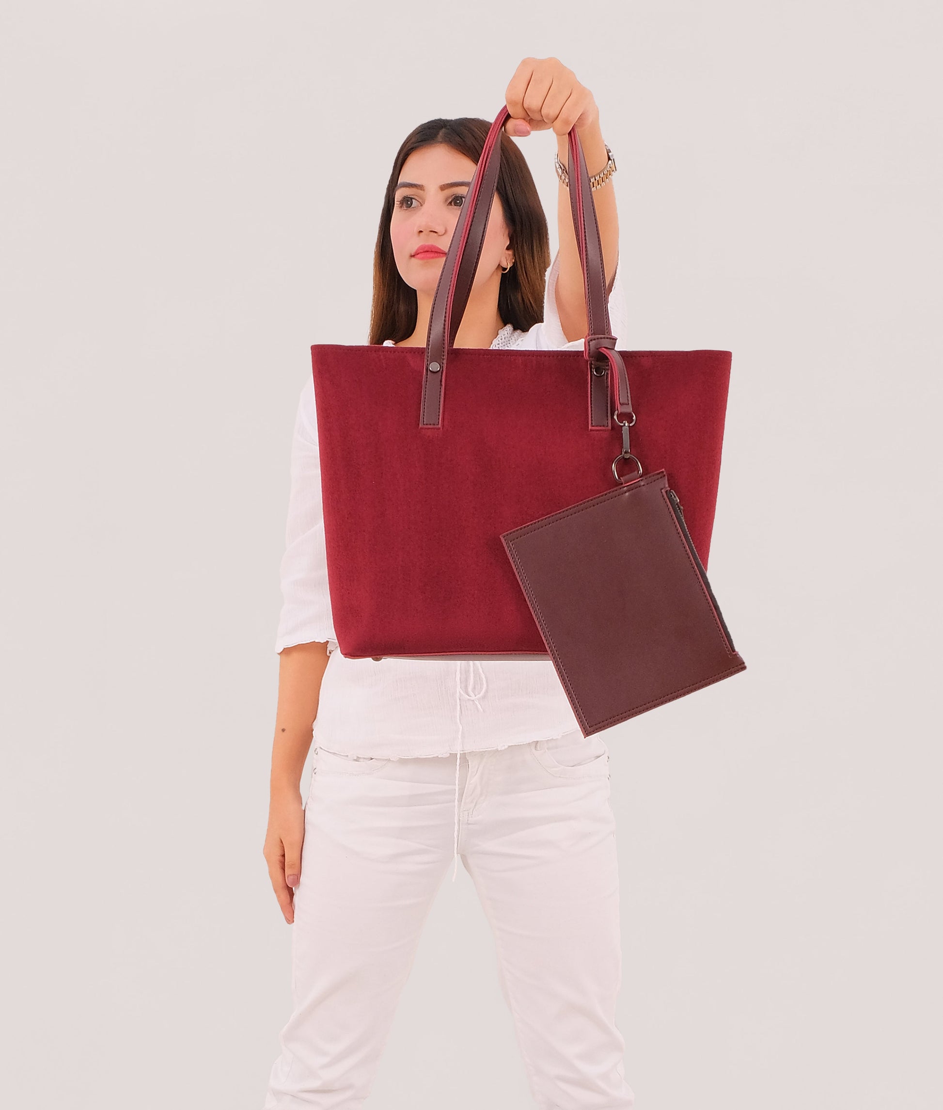 Buy Burgundy suede tote bag with detachable pouch in Pakistan