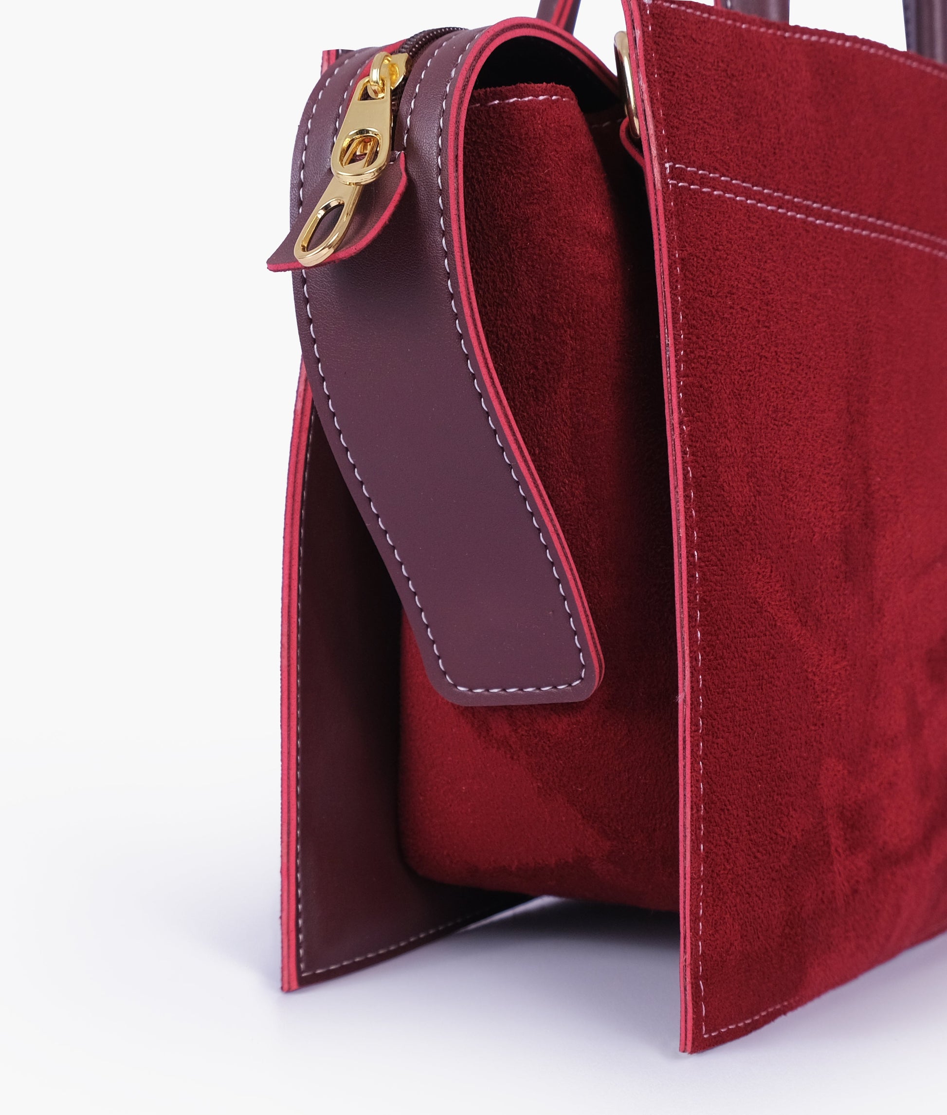 Buy Burgundy suede trapeze top-handle bag in Pakistan