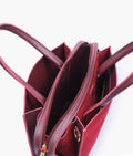 Buy Burgundy suede trapeze top-handle bag in Pakistan