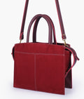 Buy Burgundy suede trapeze top-handle bag in Pakistan