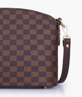 Buy Dark brown checkered dome cross-body bag in Pakistan