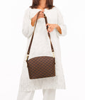 Buy Dark brown checkered dome cross-body bag in Pakistan