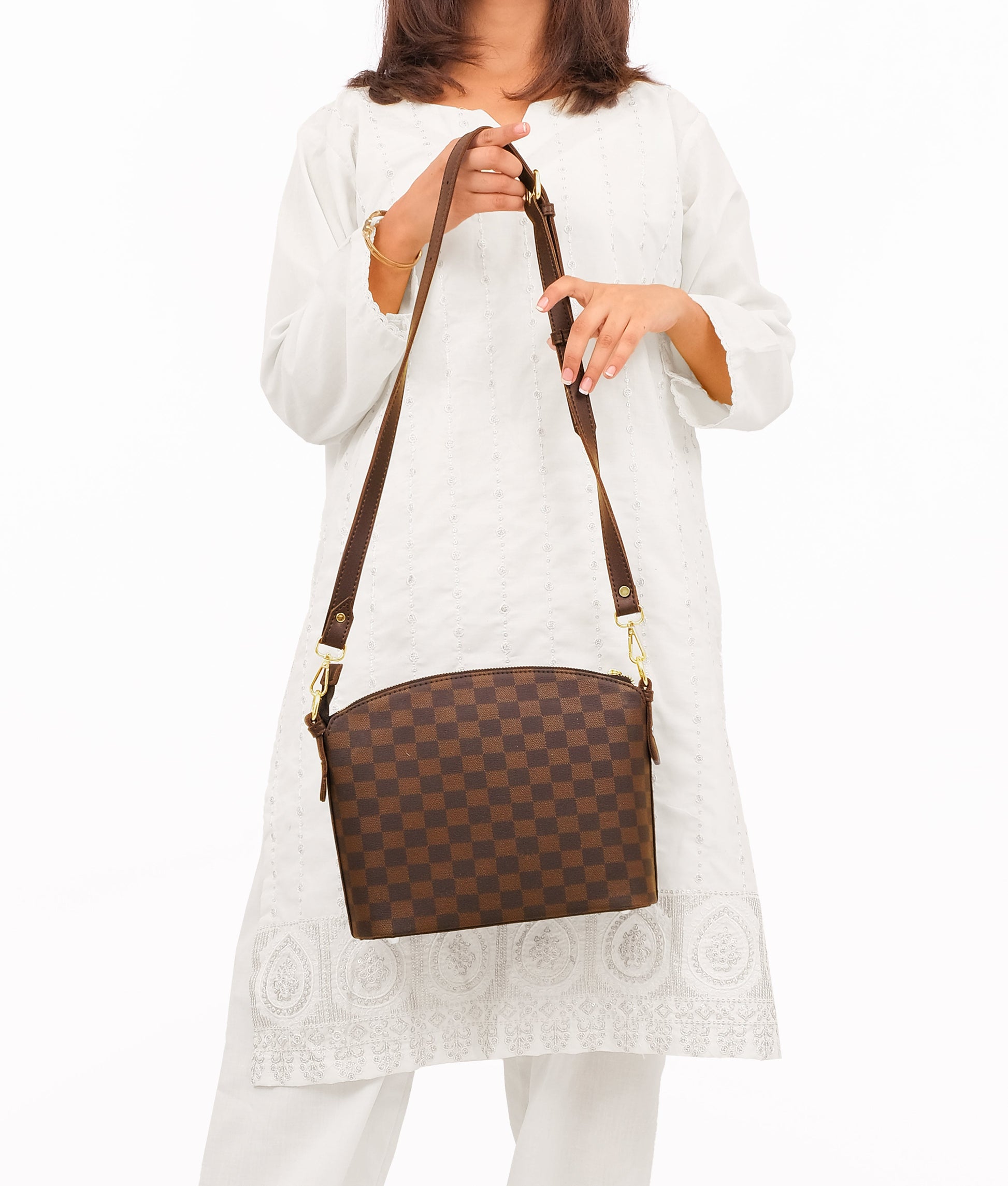 Buy Dark brown checkered dome cross-body bag in Pakistan