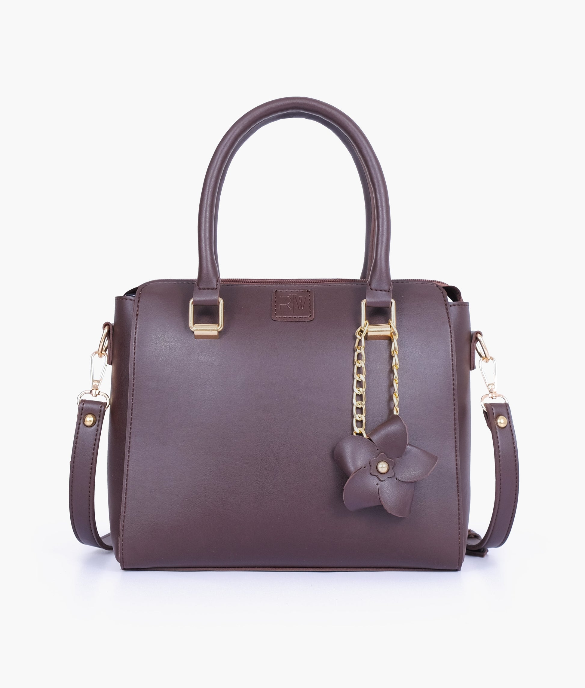 Buy Dark brown handbag with flower charm in Pakistan