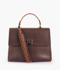 Buy Dark brown flap-over top-handle bag in Pakistan