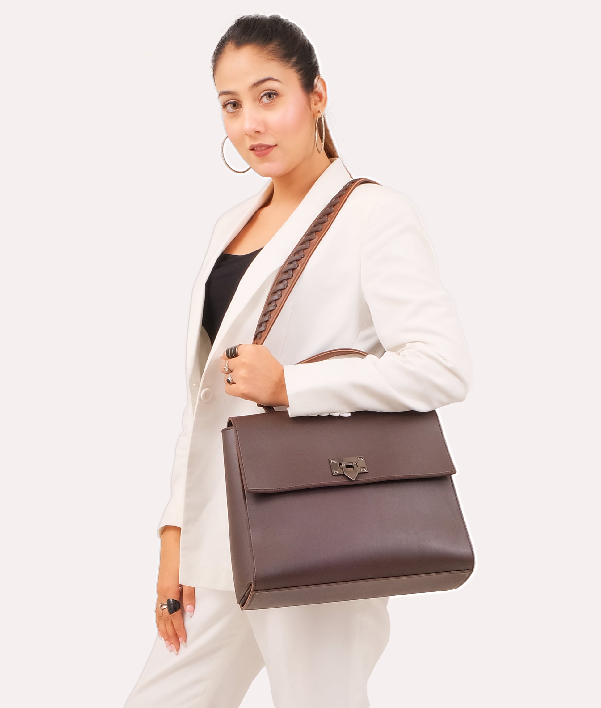 Buy Dark brown flap-over top-handle bag in Pakistan