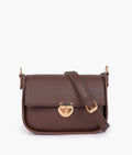 Buy Dark brown saddle bag with twist lock in Pakistan