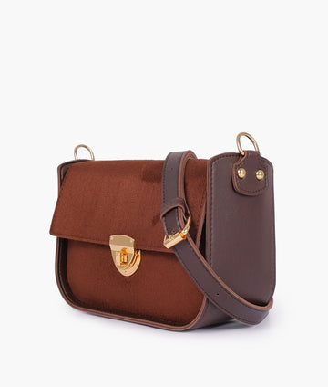 Buy Dark brown suede saddle bag with twist lock in Pakistan