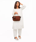 Buy Dark brown suede bowling bag with top-handle in Pakistan