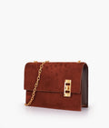 Buy Dark brown suede chain shoulder bag with twist lock in Pakistan